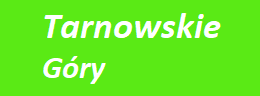 Zielona tablica z białym napisem Tarnowskie Góry dla strony internetowej trenerzy i kluby fit365